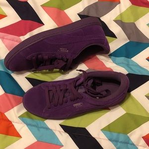 Purple suede pumas